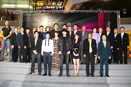 Festival organizers and sponsors gather with movie celebrities for a group photo following the press conference at Central Festival Pattaya Beach on Feb. 24.
